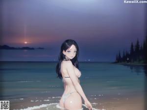 A woman in a white bikini sitting in the water.