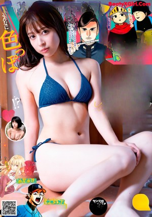 A woman in a green bathing suit sitting on the floor.