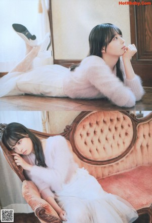 A woman laying on a bed with a teddy bear.