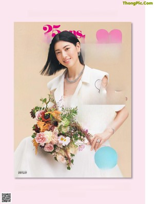 A woman in a black hat on a magazine cover.